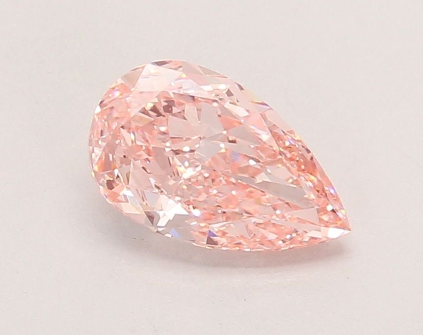 Loose Diamond - PEAR 1.28ct Fancy Vivid Pink VVS2: Loose Diamond - PEAR 1.28ct Fancy Vivid Pink VVS2 Source: This is a real non-mined Diamond that has been grown in a lab Shape: PEAR Carats: 1.28 Color: Fancy Vivid Pink Certification: IGI Video: