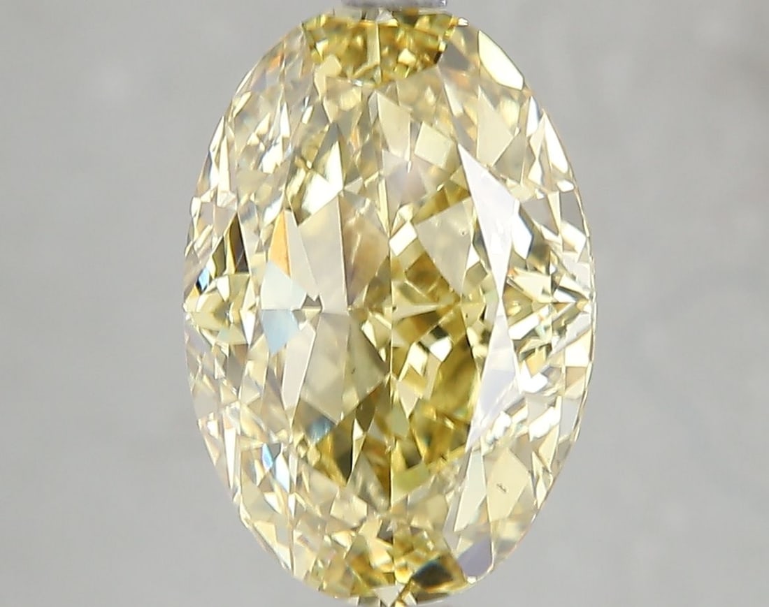 Loose Diamond - OVAL 5.03ct Fancy Intense Yellow VS2: Loose Diamond - OVAL 5.03ct Fancy Intense Yellow VS2 Source: This is a real non-mined Diamond that has been grown in a lab Shape: OVAL Carats: 5.03 Color: Fancy Intense Yellow Certification: IGI Video