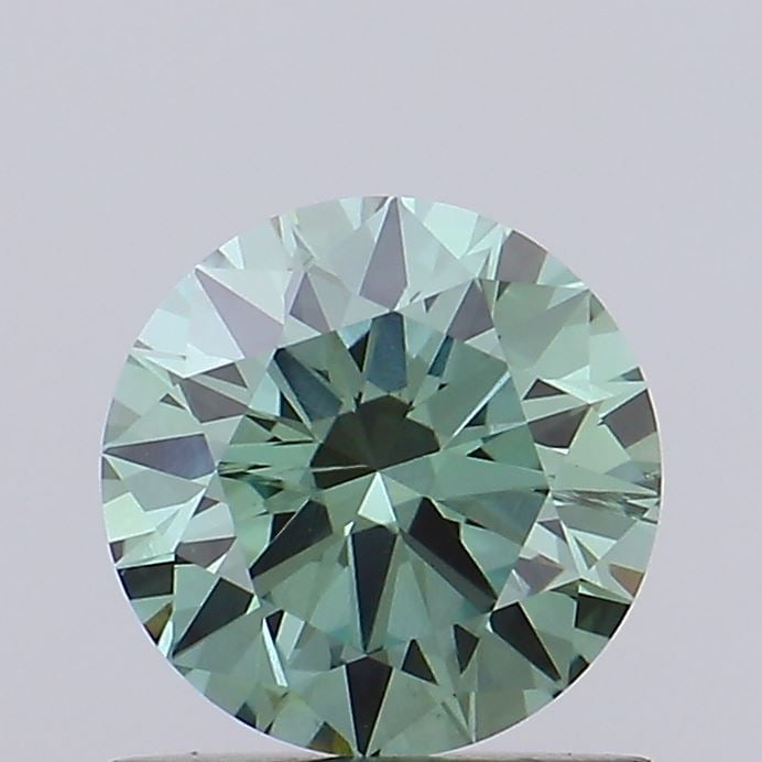 Loose Diamond - ROUND 0.9ct Fancy Vivid Green SI2: Loose Diamond - ROUND 0.9ct Fancy Vivid Green SI2 Source: This is a real non-mined Diamond that has been grown in a lab Shape: ROUND Carats: 0.9 Color: Fancy Vivid Green Certification: IGI Video: