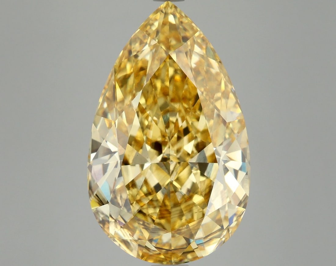 Loose Diamond - PEAR 10.61ct Fancy Vivid Yellow SI1: Loose Diamond - PEAR 10.61ct Fancy Vivid Yellow SI1 Source: This is a real non-mined Diamond that has been grown in a lab Shape: PEAR Carats: 10.61 Color: Fancy Vivid Yellow Certification: IGI Video:
