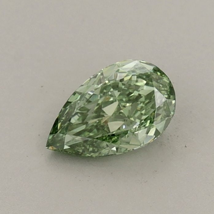 Loose Diamond - PEAR 0.44ct Fancy Vivid Green VS1: Loose Diamond - PEAR 0.44ct Fancy Vivid Green VS1 Source: This is a real non-mined Diamond that has been grown in a lab Shape: PEAR Carats: 0.44 Color: Fancy Vivid Green Certification: IGI Video: