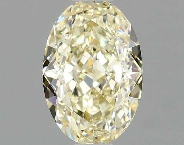 Loose Diamond - OVAL 1.06ct Fancy Light Yellow VS1: Loose Diamond - OVAL 1.06ct Fancy Light Yellow VS1 Source: This is a real non-mined Diamond that has been grown in a lab Shape: OVAL Carats: 1.06 Color: Fancy Light Yellow Certification: IGI Video: