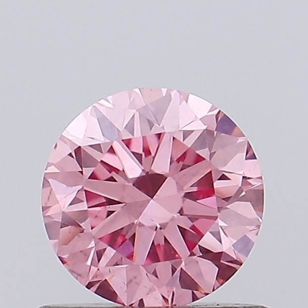 Loose Diamond - ROUND 0.54ct Fancy Intense Pink VS2: Loose Diamond - ROUND 0.54ct Fancy Intense Pink VS2 Source: This is a real non-mined Diamond that has been grown in a lab Shape: ROUND Carats: 0.54 Color: Fancy Intense Pink Certification: NONE Video:
