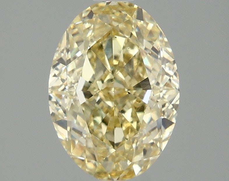 Loose Diamond - OVAL 2.09ct Fancy Yellow VS1: Loose Diamond - OVAL 2.09ct Fancy Yellow VS1 Source: This is a real non-mined Diamond that has been grown in a lab Shape: OVAL Carats: 2.09 Color: Fancy Yellow Certification: IGI Video: