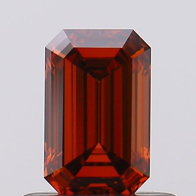 Loose Diamond - EMERALD 0.53ct Fancy Vivid Orangey Red VVS2: Loose Diamond - EMERALD 0.53ct Fancy Vivid Orangey Red VVS2 Source: This is a real non-mined Diamond that has been grown in a lab Shape: EMERALD Carats: 0.53 Color: Fancy Vivid Orangey Red Certificati