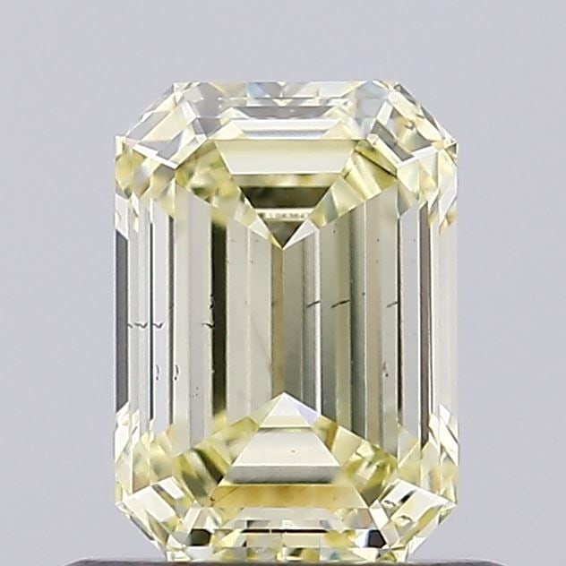 Loose Diamond - EMERALD 0.77ct Fancy Yellow VS2: Loose Diamond - EMERALD 0.77ct Fancy Yellow VS2 Source: This is a real non-mined Diamond that has been grown in a lab Shape: EMERALD Carats: 0.77 Color: Fancy Yellow Certification: IGI Video: