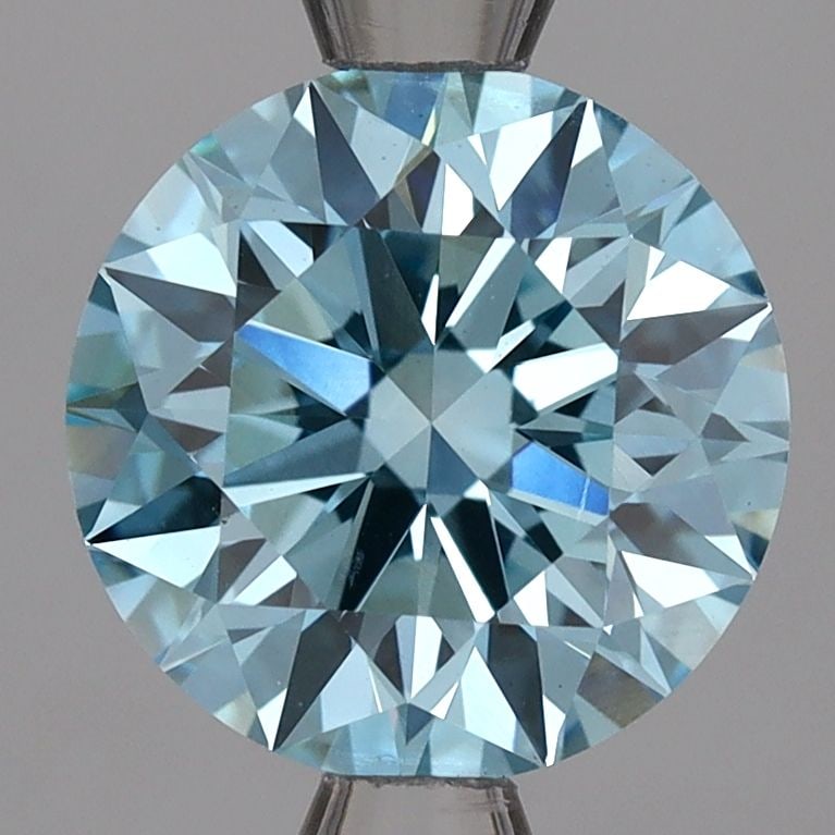 Ideal Loose Diamond - ROUND 2.09ct Fancy Vivid Blue VVS2: Ideal Loose Diamond - ROUND 2.09ct Fancy Vivid Blue VVS2 Source: This is a real non-mined Diamond that has been grown in a lab Shape: ROUND Carats: 2.09 Color: Fancy Vivid Blue Certification: IGI Vide