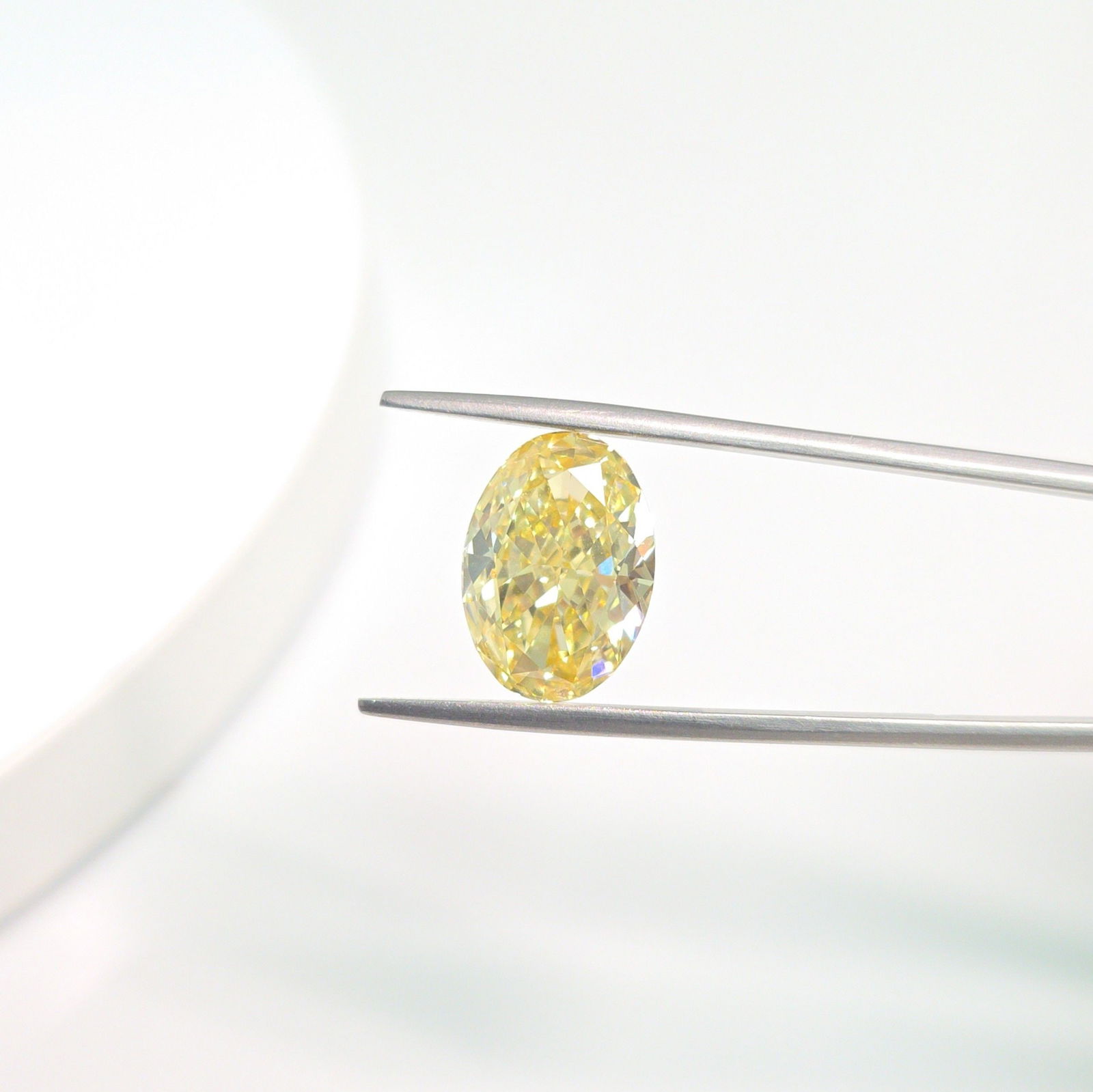 Loose Diamond - OVAL 7.03ct Fancy Intense Yellow VS1: Loose Diamond - OVAL 7.03ct Fancy Intense Yellow VS1 Source: This is a real non-mined Diamond that has been grown in a lab Shape: OVAL Carats: 7.03 Color: Fancy Intense Yellow Certification: IGI Video