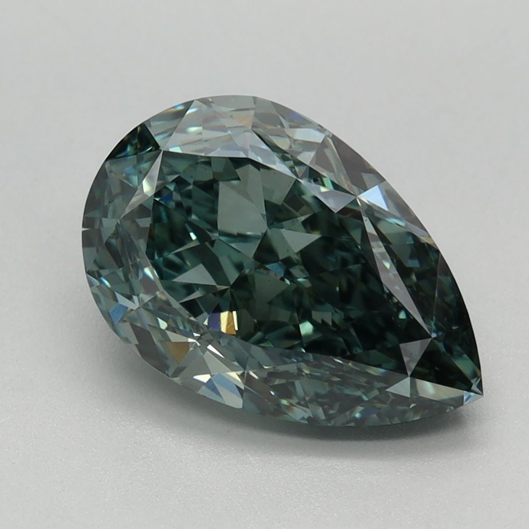 Loose Diamond - PEAR 2.42ct Fancy Vivid Green VS1: Loose Diamond - PEAR 2.42ct Fancy Vivid Green VS1 Source: This is a real non-mined Diamond that has been grown in a lab Shape: PEAR Carats: 2.42 Color: Fancy Vivid Green Certification: IGI Video: