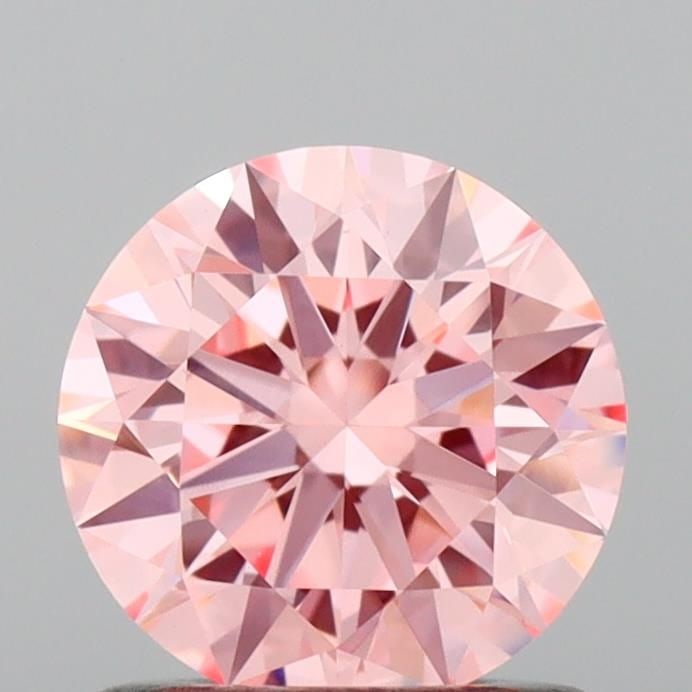 Ideal Loose Diamond - ROUND 0.93ct Fancy Vivid Pink VVS2: Ideal Loose Diamond - ROUND 0.93ct Fancy Vivid Pink VVS2 Source: This is a real non-mined Diamond that has been grown in a lab Shape: ROUND Carats: 0.93 Color: Fancy Vivid Pink Certification: IGI Vide