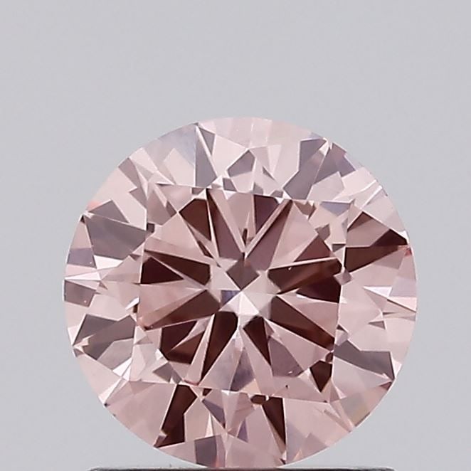Loose Diamond - ROUND 0.89ct Fancy Intense Pink VS1: Loose Diamond - ROUND 0.89ct Fancy Intense Pink VS1 Source: This is a real non-mined Diamond that has been grown in a lab Shape: ROUND Carats: 0.89 Color: Fancy Intense Pink Certification: IGI Video:
