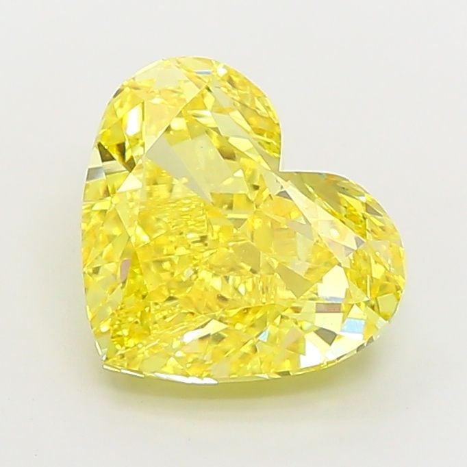 Loose Diamond - HEART 7.39ct Fancy Vivid Yellow VVS2: Loose Diamond - HEART 7.39ct Fancy Vivid Yellow VVS2 Source: This is a real non-mined Diamond that has been grown in a lab Shape: HEART Carats: 7.39 Color: Fancy Vivid Yellow Certification: IGI Video: