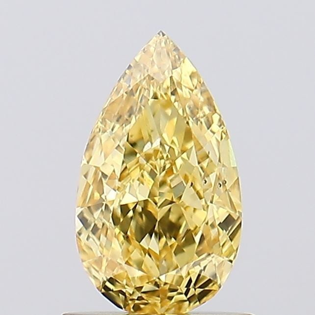 Loose Diamond - PEAR 1.01ct Fancy Vivid Yellow VS2: Loose Diamond - PEAR 1.01ct Fancy Vivid Yellow VS2 Source: This is a real non-mined Diamond that has been grown in a lab Shape: PEAR Carats: 1.01 Color: Fancy Vivid Yellow Certification: IGI Video: