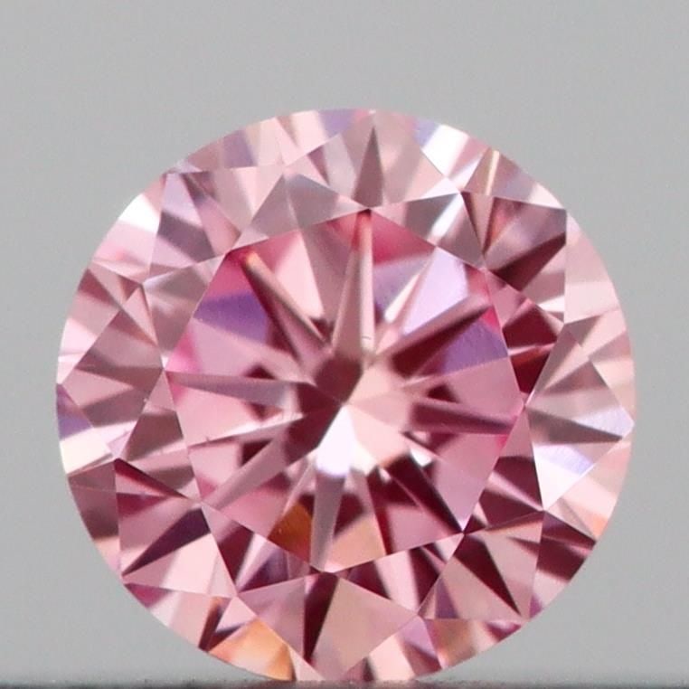 Loose Diamond - ROUND 0.21ct Fancy Vivid Pink VS1: Loose Diamond - ROUND 0.21ct Fancy Vivid Pink VS1 Source: This is a real non-mined Diamond that has been grown in a lab Shape: ROUND Carats: 0.21 Color: Fancy Vivid Pink Certification: IGI Video: