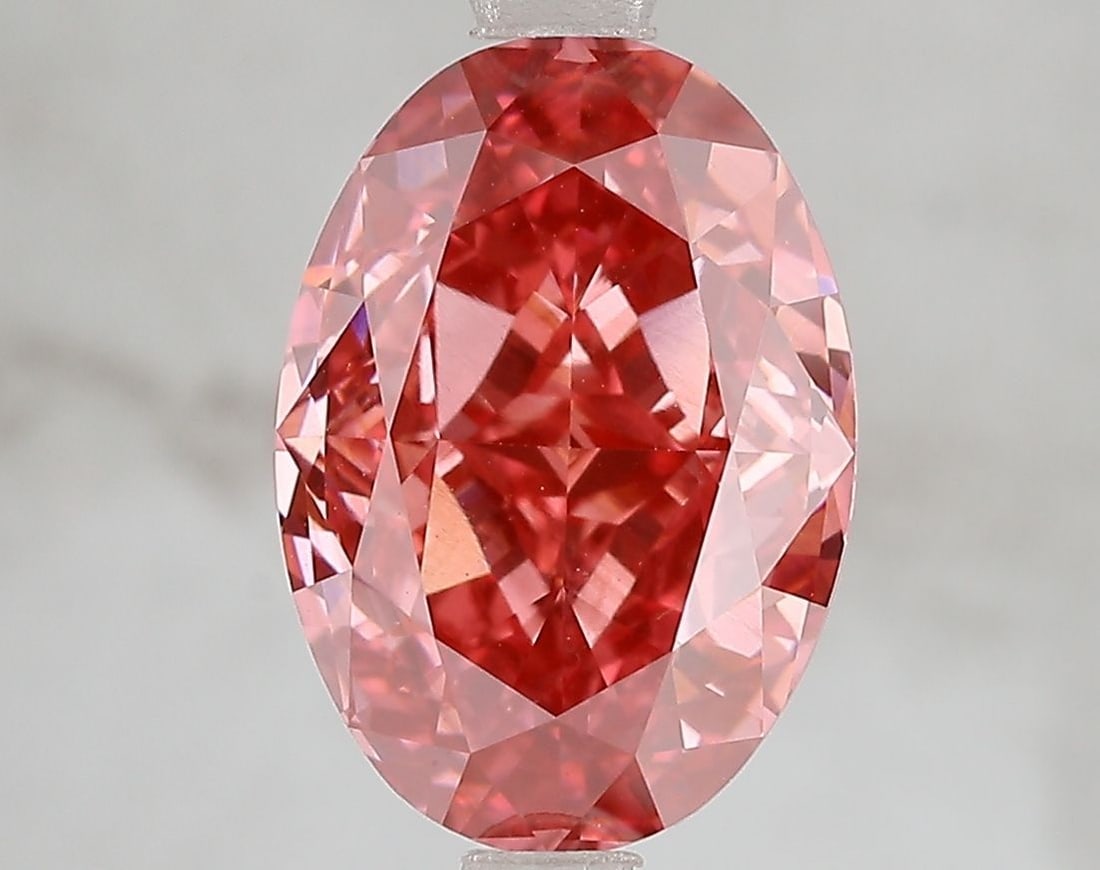 Loose Diamond - OVAL 4.55ct Fancy Vivid Pink VS2: Loose Diamond - OVAL 4.55ct Fancy Vivid Pink VS2 Source: This is a real non-mined Diamond that has been grown in a lab Shape: OVAL Carats: 4.55 Color: Fancy Vivid Pink Certification: IGI Video: