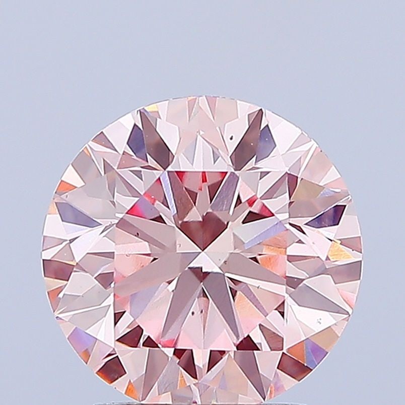 Loose Diamond - ROUND 2.6ct Fancy Vivid Pink VS2: Loose Diamond - ROUND 2.6ct Fancy Vivid Pink VS2 Source: This is a real non-mined Diamond that has been grown in a lab Shape: ROUND Carats: 2.6 Color: Fancy Vivid Pink Certification: IGI Video: