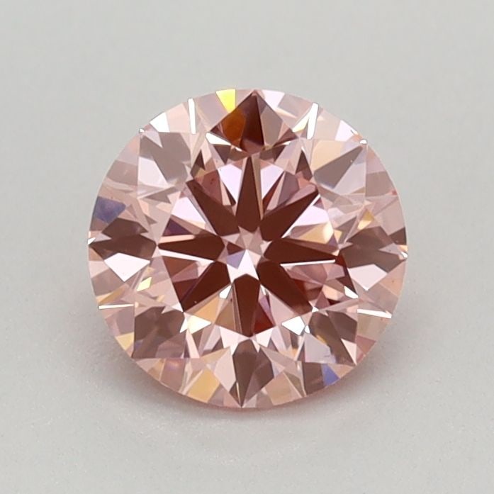 Loose Diamond - ROUND 0.59ct Fancy Vivid Pink VS1: Loose Diamond - ROUND 0.59ct Fancy Vivid Pink VS1 Source: This is a real non-mined Diamond that has been grown in a lab Shape: ROUND Carats: 0.59 Color: Fancy Vivid Pink Certification: IGI PLEASE NOTE