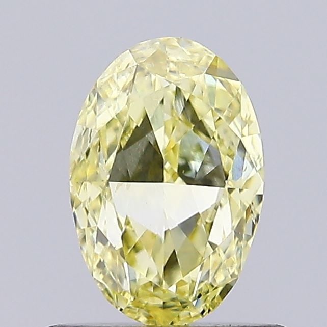 Loose Diamond - OVAL 0.72ct Fancy Intense Yellow VS2: Loose Diamond - OVAL 0.72ct Fancy Intense Yellow VS2 Source: This is a real non-mined Diamond that has been grown in a lab Shape: OVAL Carats: 0.72 Color: Fancy Intense Yellow Certification: IGI Video