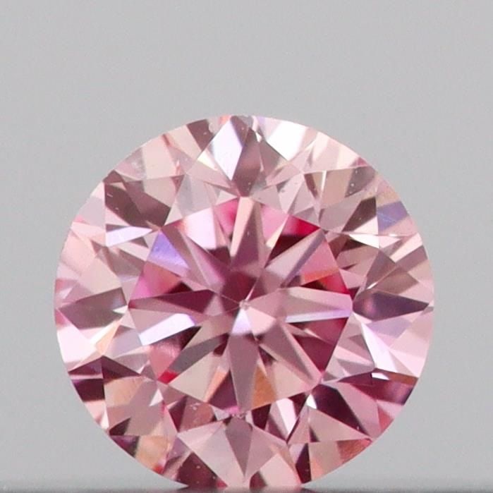 Loose Diamond - ROUND 0.12ct Fancy Vivid Pink VVS2: Loose Diamond - ROUND 0.12ct Fancy Vivid Pink VVS2 Source: This is a real non-mined Diamond that has been grown in a lab Shape: ROUND Carats: 0.12 Color: Fancy Vivid Pink Certification: IGI Video: