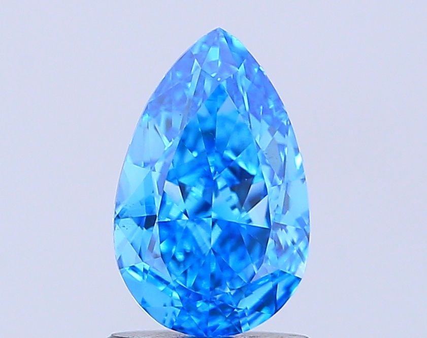 Loose Diamond - PEAR 1.83ct Fancy Vivid Blue VS1: Loose Diamond - PEAR 1.83ct Fancy Vivid Blue VS1 Source: This is a real non-mined Diamond that has been grown in a lab Shape: PEAR Carats: 1.83 Color: Fancy Vivid Blue Certification: IGI Video: