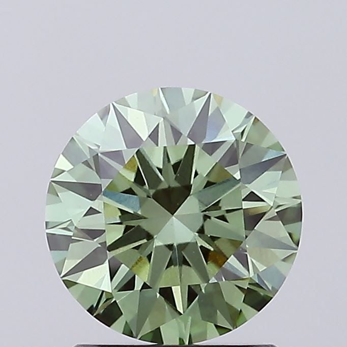 Ideal Loose Diamond - ROUND 1.27ct Fancy Vivid Green VS1: Ideal Loose Diamond - ROUND 1.27ct Fancy Vivid Green VS1 Source: This is a real non-mined Diamond that has been grown in a lab Shape: ROUND Carats: 1.27 Color: Fancy Vivid Green Certification: IGI Vid