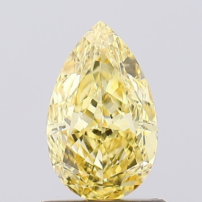 Loose Diamond - PEAR 1.08ct Fancy Vivid Yellow VVS2: Loose Diamond - PEAR 1.08ct Fancy Vivid Yellow VVS2 Source: This is a real non-mined Diamond that has been grown in a lab Shape: PEAR Carats: 1.08 Color: Fancy Vivid Yellow Certification: IGI Video: