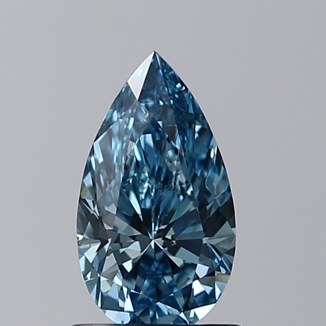 Loose Diamond - PEAR 0.9ct Fancy Vivid Blue VS2: Loose Diamond - PEAR 0.9ct Fancy Vivid Blue VS2 Source: This is a real non-mined Diamond that has been grown in a lab Shape: PEAR Carats: 0.9 Color: Fancy Vivid Blue Certification: IGI Video: