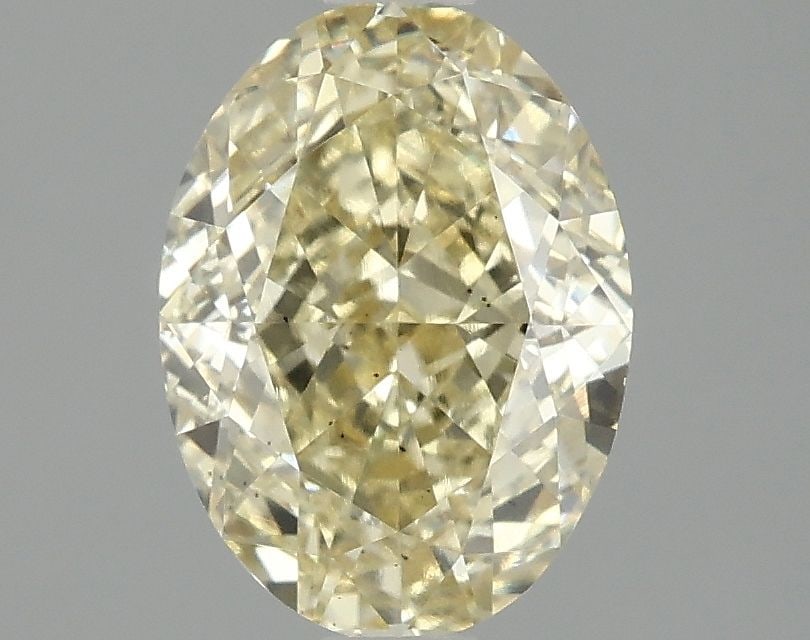 Loose Diamond - OVAL 2.1ct Fancy Intense Yellow VS2: Loose Diamond - OVAL 2.1ct Fancy Intense Yellow VS2 Source: This is a real non-mined Diamond that has been grown in a lab Shape: OVAL Carats: 2.1 Color: Fancy Intense Yellow Certification: IGI Video: