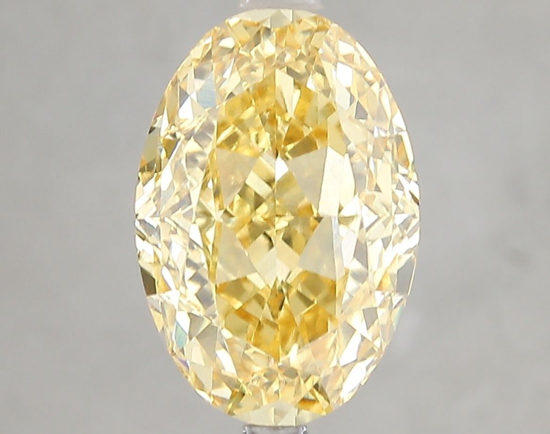 Loose Diamond - OVAL 5.01ct Fancy Vivid Yellow VS1: Loose Diamond - OVAL 5.01ct Fancy Vivid Yellow VS1 Source: This is a real non-mined Diamond that has been grown in a lab Shape: OVAL Carats: 5.01 Color: Fancy Vivid Yellow Certification: IGI Video: