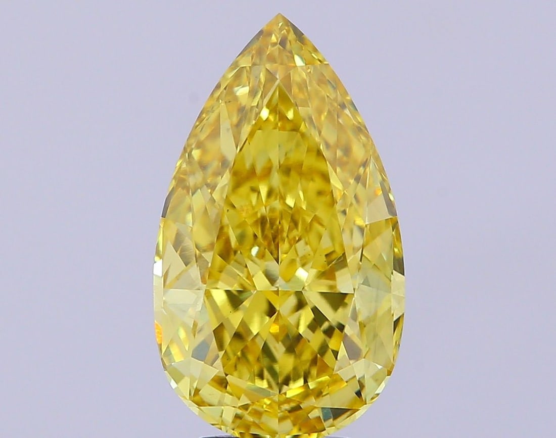 Loose Diamond - PEAR 5.73ct Fancy Vivid Yellow VS1: Loose Diamond - PEAR 5.73ct Fancy Vivid Yellow VS1 Source: This is a real non-mined Diamond that has been grown in a lab Shape: PEAR Carats: 5.73 Color: Fancy Vivid Yellow Certification: IGI Video: