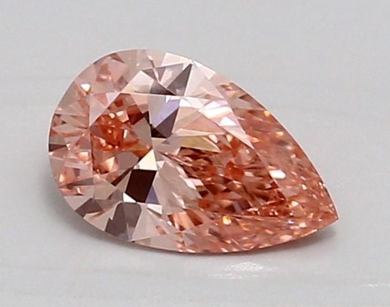 Loose Diamond - PEAR 0.9ct Fancy Vivid Pink VVS2: Loose Diamond - PEAR 0.9ct Fancy Vivid Pink VVS2 Source: This is a real non-mined Diamond that has been grown in a lab Shape: PEAR Carats: 0.9 Color: Fancy Vivid Pink Certification: IGI Video: