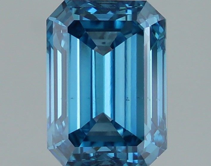 Loose Diamond - EMERALD 1.61ct Fancy Vivid Blue VS1: Loose Diamond - EMERALD 1.61ct Fancy Vivid Blue VS1 Source: This is a real non-mined Diamond that has been grown in a lab Shape: EMERALD Carats: 1.61 Color: Fancy Vivid Blue Certification: IGI Video: