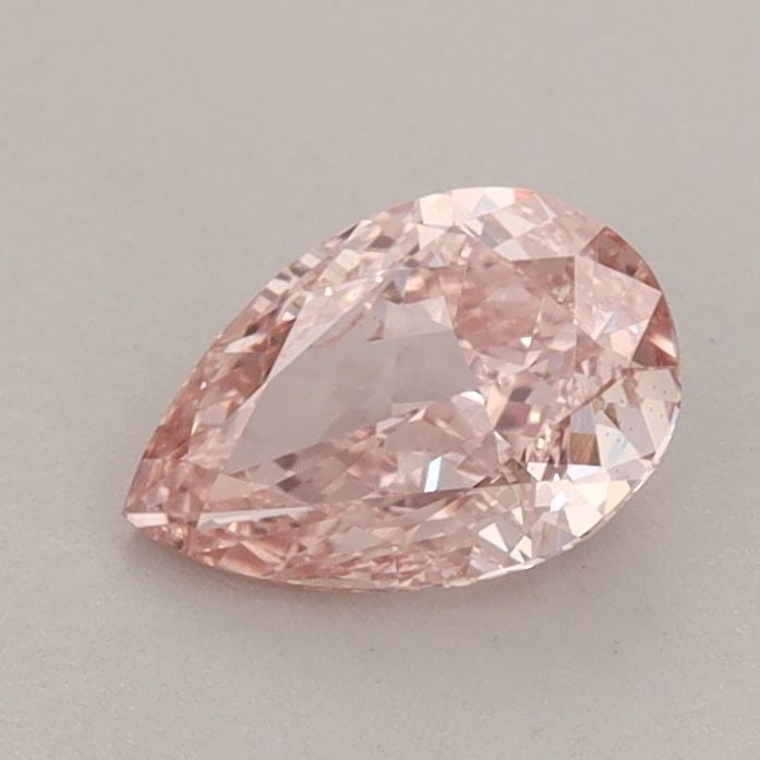 Loose Diamond - PEAR 0.81ct Fancy Vivid Pink VS1: Loose Diamond - PEAR 0.81ct Fancy Vivid Pink VS1 Source: This is a real non-mined Diamond that has been grown in a lab Shape: PEAR Carats: 0.81 Color: Fancy Vivid Pink Certification: IGI Video: