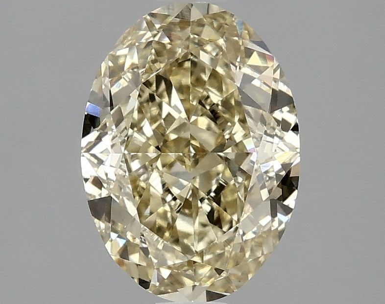 Loose Diamond - OVAL 2.06ct Fancy Yellow VVS2: Loose Diamond - OVAL 2.06ct Fancy Yellow VVS2 Source: This is a real non-mined Diamond that has been grown in a lab Shape: OVAL Carats: 2.06 Color: Fancy Yellow Certification: IGI Video:
