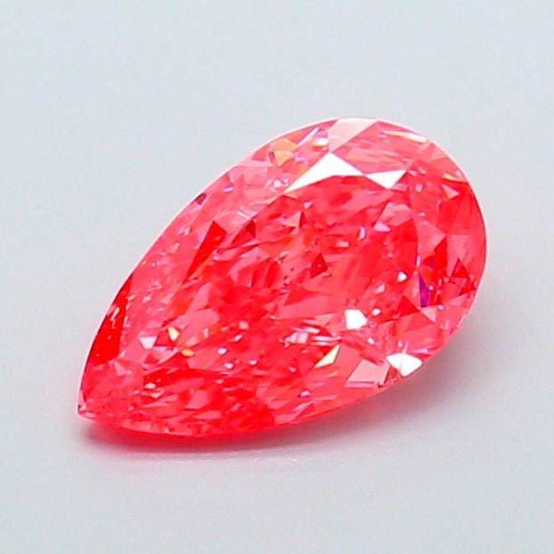 Loose Diamond - PEAR 1.34ct Fancy Vivid Pink VVS2: Loose Diamond - PEAR 1.34ct Fancy Vivid Pink VVS2 Source: This is a real non-mined Diamond that has been grown in a lab Shape: PEAR Carats: 1.34 Color: Fancy Vivid Pink Certification: IGI Video:
