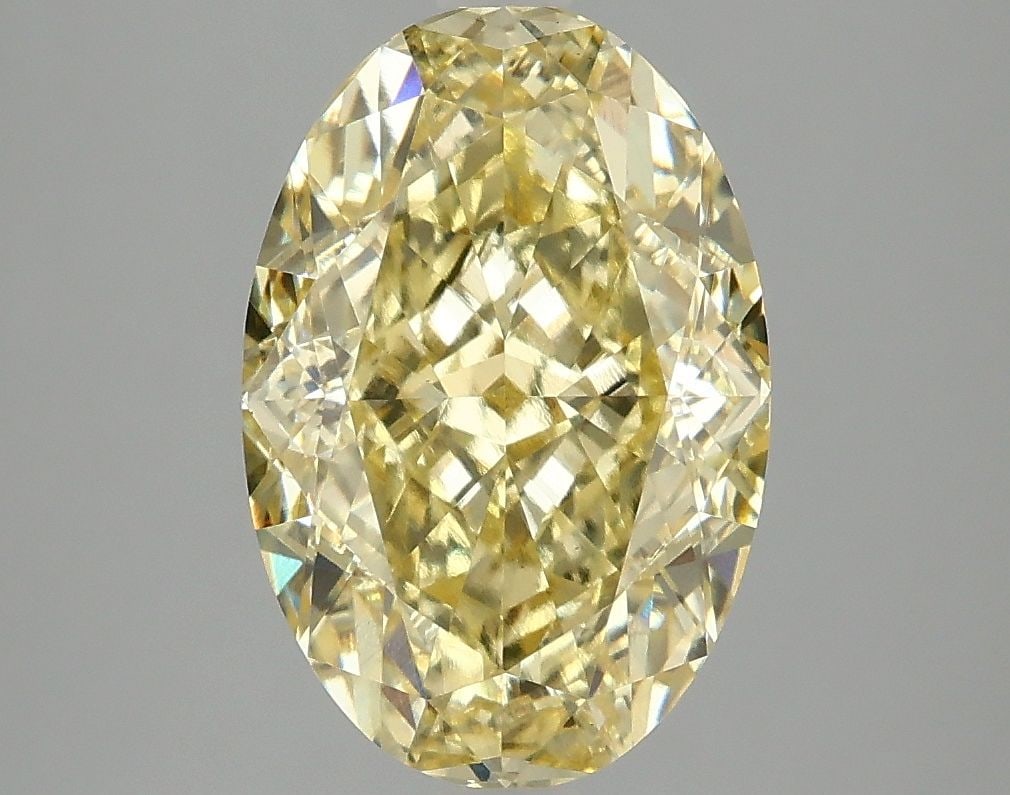 Loose Diamond - OVAL 4.01ct Fancy Vivid Yellow VS1: Loose Diamond - OVAL 4.01ct Fancy Vivid Yellow VS1 Source: This is a real non-mined Diamond that has been grown in a lab Shape: OVAL Carats: 4.01 Color: Fancy Vivid Yellow Certification: IGI Video: