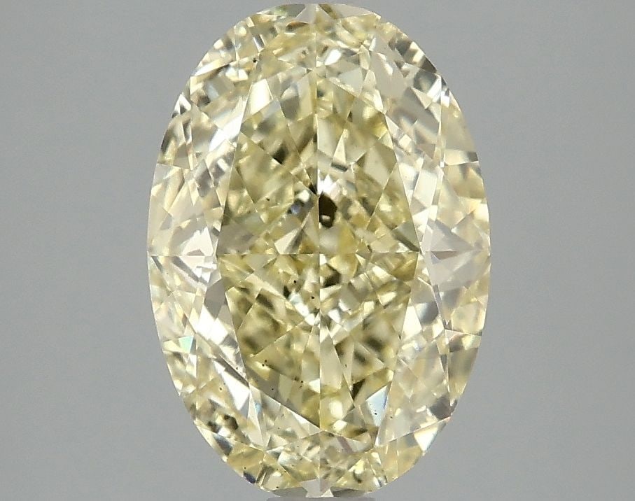 Loose Diamond - OVAL 3.03ct Fancy Vivid Yellow SI1: Loose Diamond - OVAL 3.03ct Fancy Vivid Yellow SI1 Source: This is a real non-mined Diamond that has been grown in a lab Shape: OVAL Carats: 3.03 Color: Fancy Vivid Yellow Certification: IGI Video: