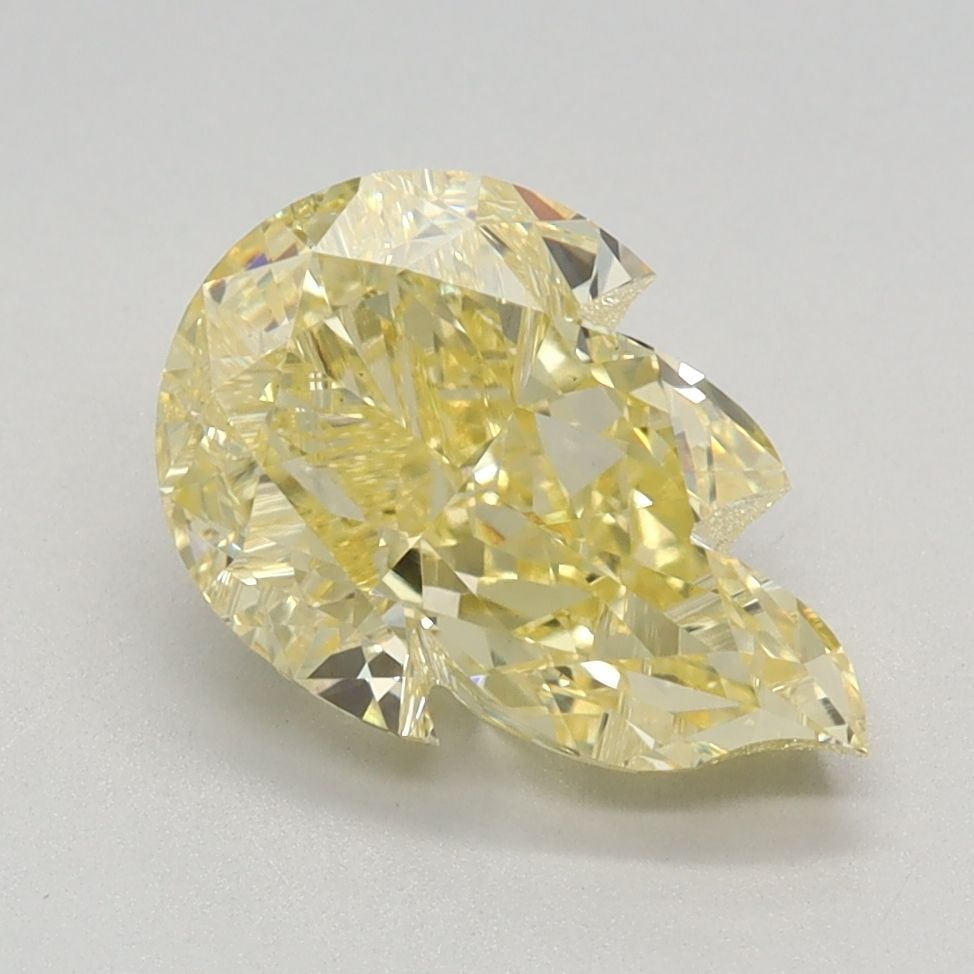 Loose Diamond - OTHER 2.2ct Fancy Vivid Yellow VS1: Loose Diamond - OTHER 2.2ct Fancy Vivid Yellow VS1 Source: This is a real non-mined Diamond that has been grown in a lab Shape: OTHER Carats: 2.2 Color: Fancy Vivid Yellow Certification: IGI Video: