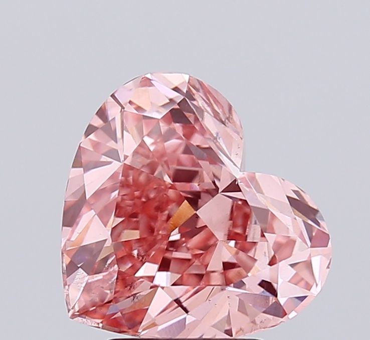 Loose Diamond - HEART 3.12ct Fancy Vivid Pink VS2: Loose Diamond - HEART 3.12ct Fancy Vivid Pink VS2 Source: This is a real non-mined Diamond that has been grown in a lab Shape: HEART Carats: 3.12 Color: Fancy Vivid Pink Certification: IGI Video: