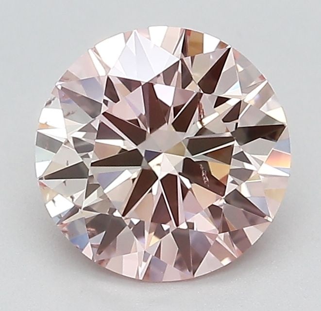 Loose Diamond - ROUND 1.55ct Fancy Pink SI1: Loose Diamond - ROUND 1.55ct Fancy Pink SI1 Source: This is a real non-mined Diamond that has been grown in a lab Shape: ROUND Carats: 1.55 Color: Fancy Pink Certification: IGI Video: