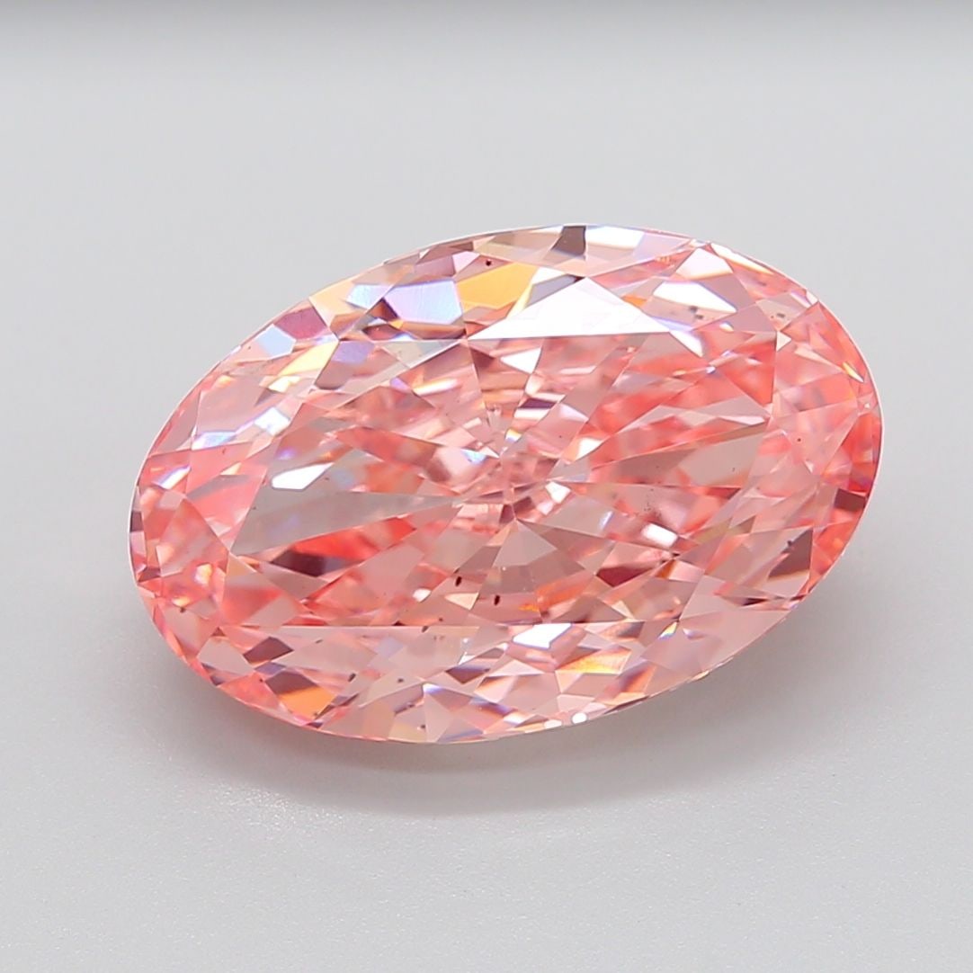 Loose Diamond - OVAL 14.03ct Fancy Vivid Pink VS2: Loose Diamond - OVAL 14.03ct Fancy Vivid Pink VS2 Source: This is a real non-mined Diamond that has been grown in a lab Shape: OVAL Carats: 14.03 Color: Fancy Vivid Pink Certification: IGI Video: