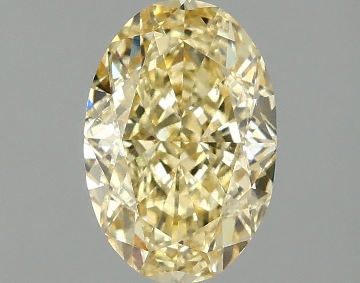 Loose Diamond - OVAL 1.5ct Fancy Intense Yellow VS2: Loose Diamond - OVAL 1.5ct Fancy Intense Yellow VS2 Source: This is a real non-mined Diamond that has been grown in a lab Shape: OVAL Carats: 1.5 Color: Fancy Intense Yellow Certification: IGI Video: