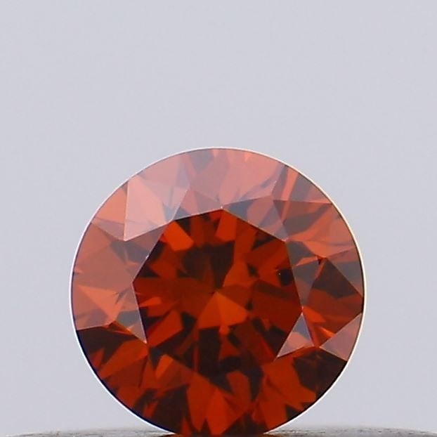 Loose Diamond - ROUND 0.19ct Fancy Vivid Orange VS1: Loose Diamond - ROUND 0.19ct Fancy Vivid Orange VS1 Source: This is a real non-mined Diamond that has been grown in a lab Shape: ROUND Carats: 0.19 Color: Fancy Vivid Orange Certification: IGI Video: