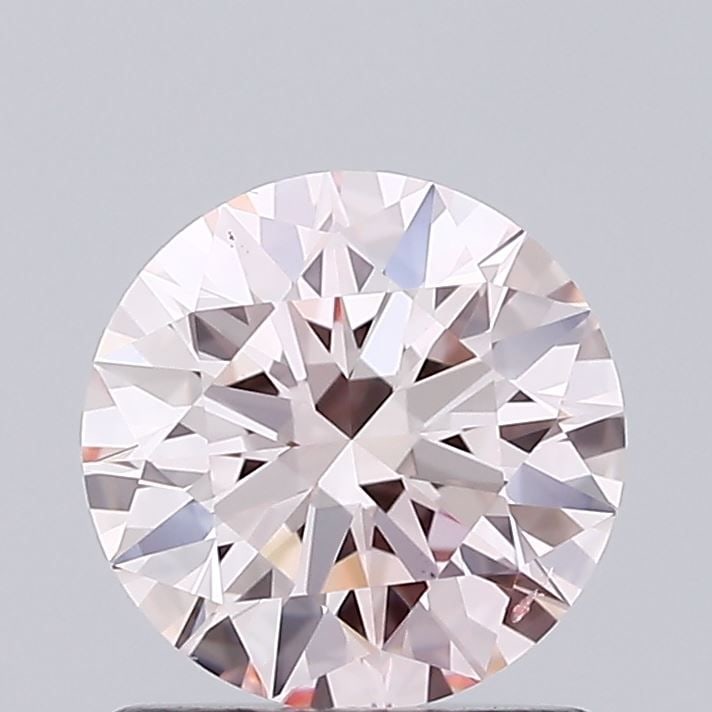 Ideal Loose Diamond - ROUND 0.91ct Fancy Light Pink VS2: Ideal Loose Diamond - ROUND 0.91ct Fancy Light Pink VS2 Source: This is a real non-mined Diamond that has been grown in a lab Shape: ROUND Carats: 0.91 Color: Fancy Light Pink Certification: IGI Video
