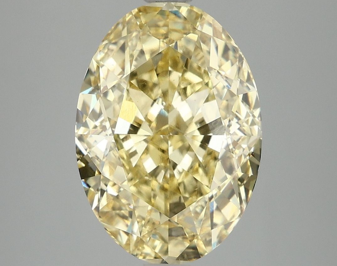 Loose Diamond - OVAL 5.06ct Fancy Vivid Yellow VS1: Loose Diamond - OVAL 5.06ct Fancy Vivid Yellow VS1 Source: This is a real non-mined Diamond that has been grown in a lab Shape: OVAL Carats: 5.06 Color: Fancy Vivid Yellow Certification: IGI Video: