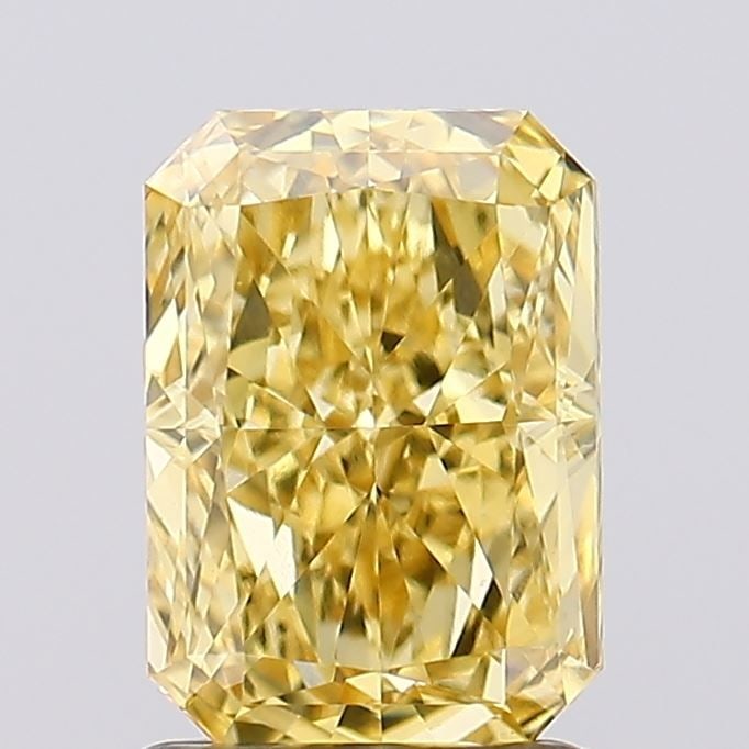 Loose Diamond - RADIANT 1.55ct Fancy Vivid Yellow VVS2: Loose Diamond - RADIANT 1.55ct Fancy Vivid Yellow VVS2 Source: This is a real non-mined Diamond that has been grown in a lab Shape: RADIANT Carats: 1.55 Color: Fancy Vivid Yellow Certification: IGI Vi