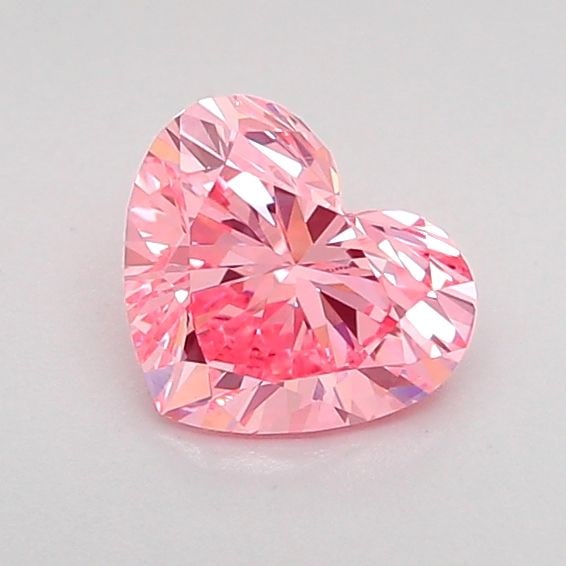 Loose Diamond - HEART 0.69ct Fancy Vivid Pink VS1: Loose Diamond - HEART 0.69ct Fancy Vivid Pink VS1 Source: This is a real non-mined Diamond that has been grown in a lab Shape: HEART Carats: 0.69 Color: Fancy Vivid Pink Certification: IGI Video: