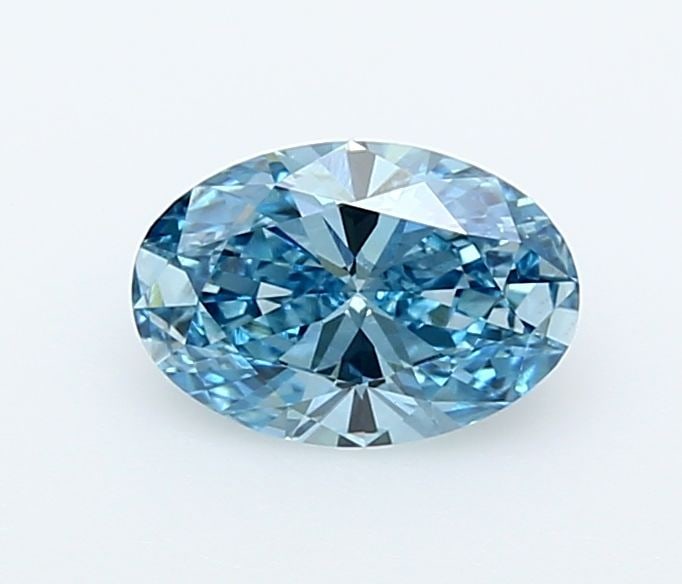 Loose Diamond - OVAL 1.02ct Fancy Vivid Blue VVS2: Loose Diamond - OVAL 1.02ct Fancy Vivid Blue VVS2 Source: This is a real non-mined Diamond that has been grown in a lab Shape: OVAL Carats: 1.02 Color: Fancy Vivid Blue Certification: IGI Video:
