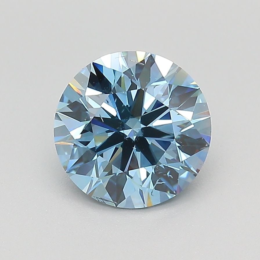 Ideal Loose Diamond - ROUND 1.73ct Fancy Vivid Blue SI2: Ideal Loose Diamond - ROUND 1.73ct Fancy Vivid Blue SI2 Source: This is a real non-mined Diamond that has been grown in a lab Shape: ROUND Carats: 1.73 Color: Fancy Vivid Blue Certification: IGI Video