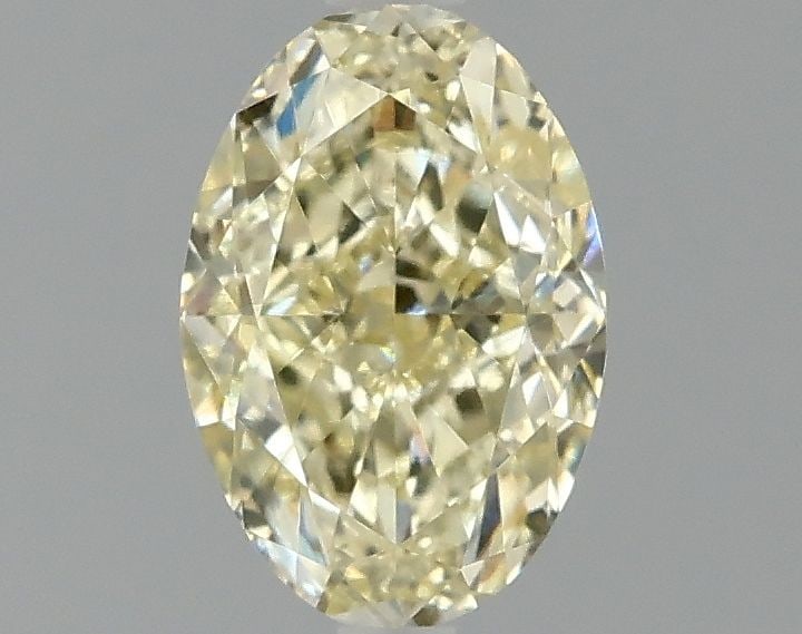Loose Diamond - OVAL 1.01ct Fancy Yellow VVS2: Loose Diamond - OVAL 1.01ct Fancy Yellow VVS2 Source: This is a real non-mined Diamond that has been grown in a lab Shape: OVAL Carats: 1.01 Color: Fancy Yellow Certification: IGI Video: